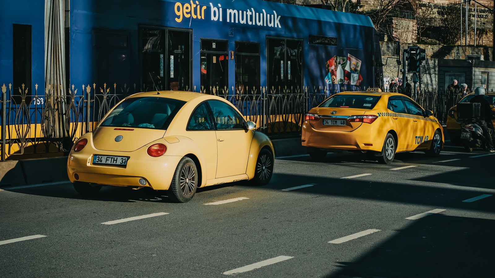 Yellow taxis moving through a busy Istanbul street — Two-Sided Growth for a Ride-Hailing Platform